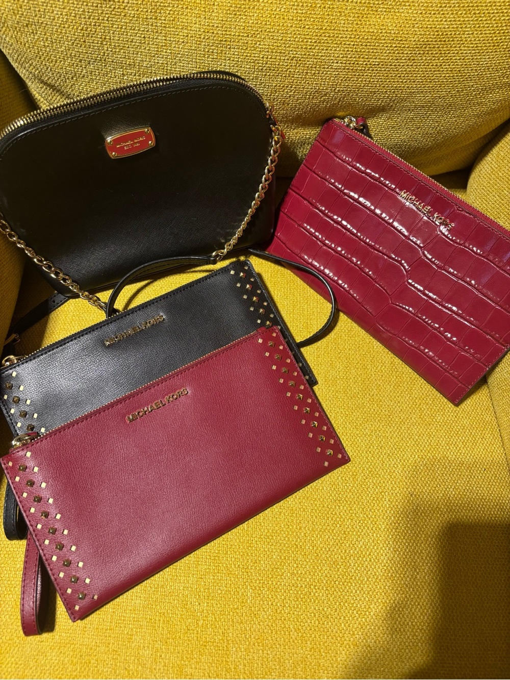 Michael Kors Black and Burgundy Leather Wristlet Trio
